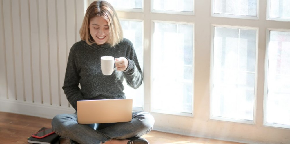 woman-in-gray-sweater-drinking-coffee-3759089-1024x509